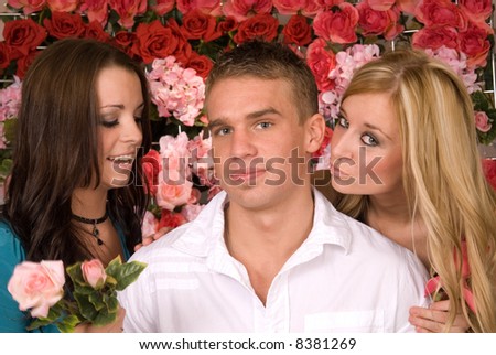 A lucky young man gets the attention of two women
