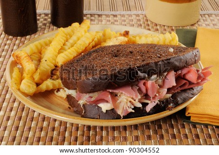 A corned beef or Reuben sandwich on dark rye bread