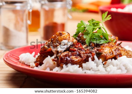 Sweet and sour pork and rice on a plate