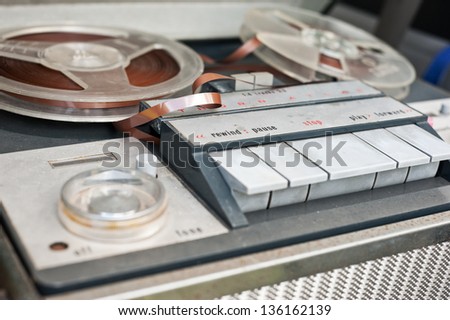 https://image.shutterstock.com/display_pic_with_logo/552019/136162139/stock-photo-old-technology-reel-to-reel-player-something-i-found-when-clearing-out-the-shed-136162139.jpg