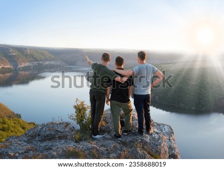 Similar – Foto Bild Auf Stein stehender Junge mit VR-Brille gegen Berg