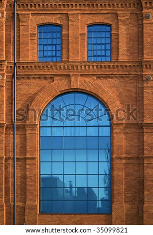 West side of andel's Hotel in Lodz - Central Europe, Poland. Historic factory building style.