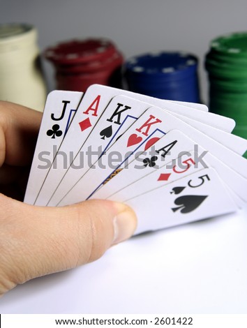 Poker Hand concept - Spelling JAKKA55 chips in background, shallow depth of field