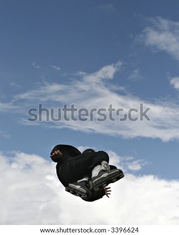Inline Skater Jumping - Clouds and blue sky, space for text etc.