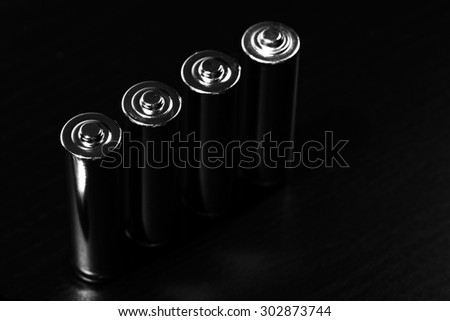 The batteries on a black background, an independent source of energy.