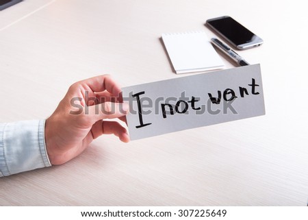 A man holding a sign with the text, for motivation.