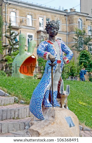 KIEV, UKRAINE - JUNE 28: The Little Prince and his fox sculpture at Pejzazhna alley, the famous children\'s park on June 28, 2012 in Kiev, Ukraine
