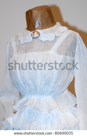 KIEV, UKRAINE - APRIL 16: A fragment of a woman\'s white dress is on display at the museum exhibit of Marina Ivanova\'s private collection of antique woman\'s clothes on April 16, 2011 in Kiev, Ukraine.