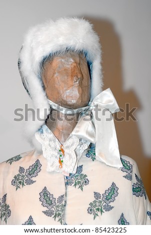 KIEV, UKRAINE - APRIL 16: An original mantlet and warm hat are on display at the museum exhibit of Marina Ivanova\'s private collection of antique woman\'s clothes on April 16, 2011 in Kiev, Ukraine.