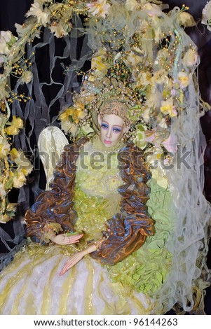 KIEV, UKRAINE - FEBRUARY 26: A collectible doll, which resembles a fantastic lady bird detailed, is on display at the Fashion Doll International exhibit on February 26, 2012 in Kiev, Ukraine.