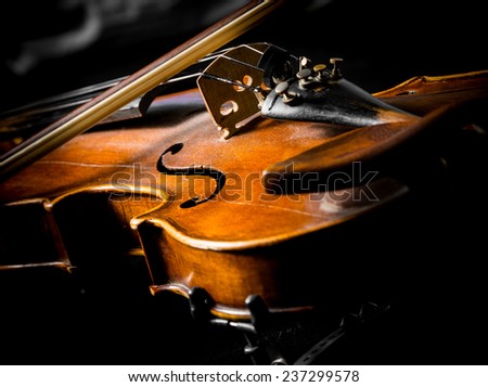 Similar – Foto Bild Nahaufnahme einer Violine mit Bogen. Braune Orchestergeige. Finger auf der Tastatur der Violine.