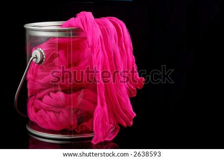 Pink Fabric Flowing Over Edge of Paint Can