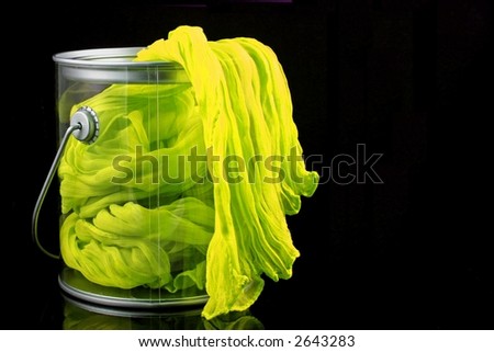 Fabric Flowing over Edge of Paint Can