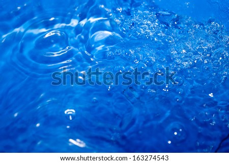 blue bubbling water as background