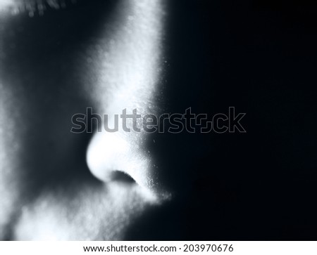nose on a black background