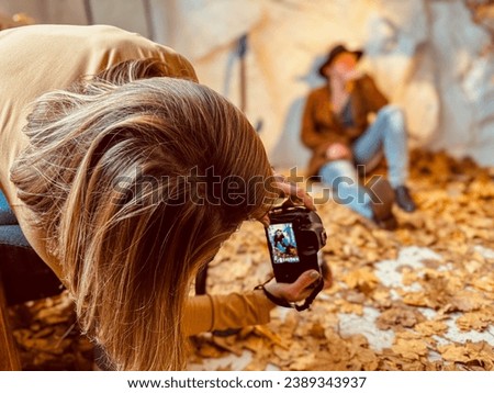 Similar – Image, Stock Photo Photographing autumn in the morning sun….   Shadow selfie in the park …