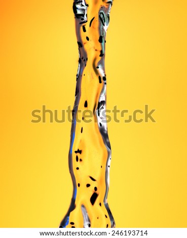 jet of water on a yellow background