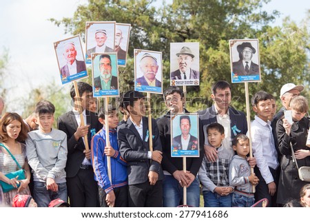 SHYMKENT city, KAZAKHSTAN MAY 9, 2015: Victory Day. The memory of soldiers of the Great Patriotic War. Victory Day celebration in the city of Shymkent, Kazakhstan May 9, 2015