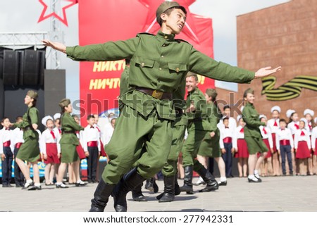SHYMKENT city, KAZAKHSTAN MAY 9, 2015: Gala concert with the participation of theater actors, Victory Day, in memory of the soldiers of the Great Patriotic War.
