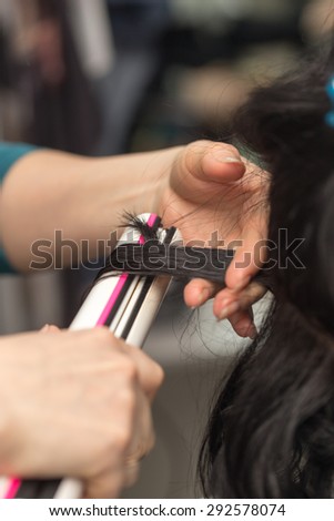 Permanent hair in a beauty salon