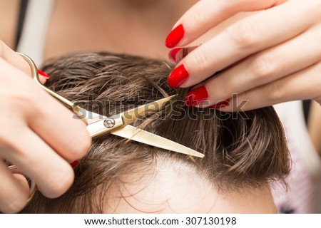 men\'s hair cutting scissors in a beauty salon