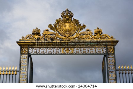 Ornate golden gate entry leading into the Ch?teau de Versailles; France Photo stock © 