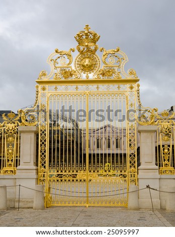 Ornate golden gate entry leading into the Ch?teau de Versailles; France Photo stock © 