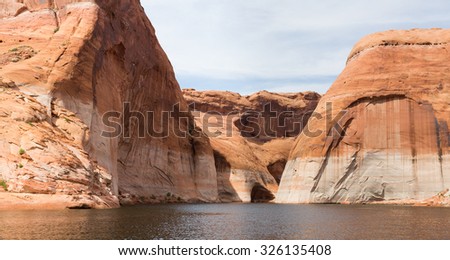 Large desert rock sandstone formation in the sunshine at Lake Powell, Utah