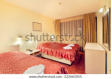 Interior of a hotel room for two, modern and classic style.