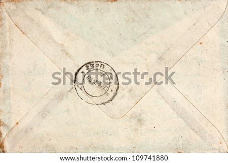 Old closed blank mail envelope with stamp