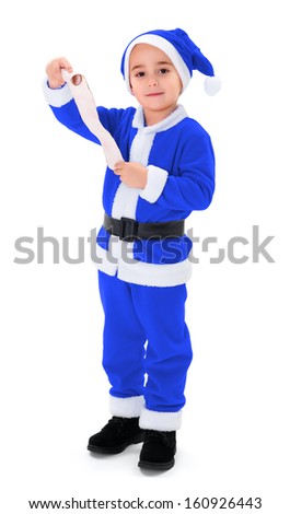 Little boy wearing blue Santa Claus uniform, holding wish list