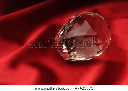 crystal lies on a red background