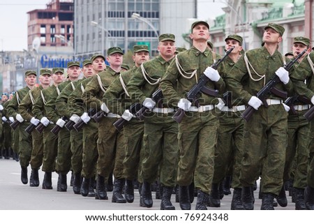 NOVOSIBIRSK - MAY 9: The on parade dedicated to Victory Day in Great Patriotic War, soldiers bearing arms demonstrate a willingness to protect on May 9, 2011 in Novosibirsk Russia
