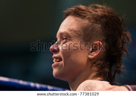 NOVOSIBIRSK - MAY 15: Russian Championship in women\'s boxing.portrait Olesya Gladkova after winning the first match in the championship on May 15, 2011, Novosibirsk Russia