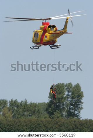 Dutch rescue helicopter (Agusta Bell AB412 SP)  lifting victim (Dutch Airforce open days, Leeuwarden 2006)