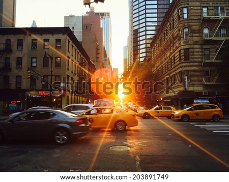 Manhattan, New York - June 19, 2014, 2nd Avenue and 52nd street. Nearing the summer solstice, the setting sun illuminates East-West oriented streets. iPhone photo.