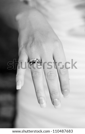 Bride showing engagement and wedding ring