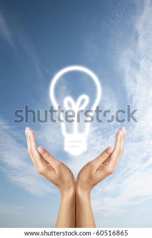 glowing bulb in hands