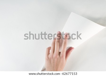 Hand turning page
