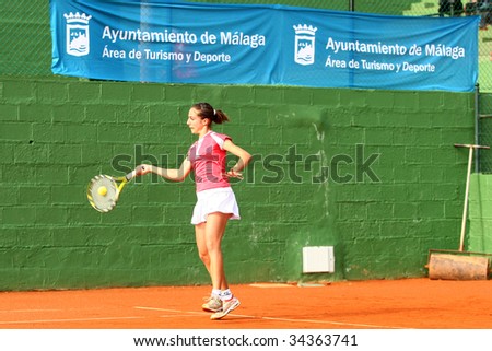 MALAGA, SPAIN – JANUARY 11 : Silvia Fuentes in action during the final match of the 1st round of the Nike Junior Tennis Tour tournament at Malaga Tennis Club January 11, 2009 in Malaga, Spain.