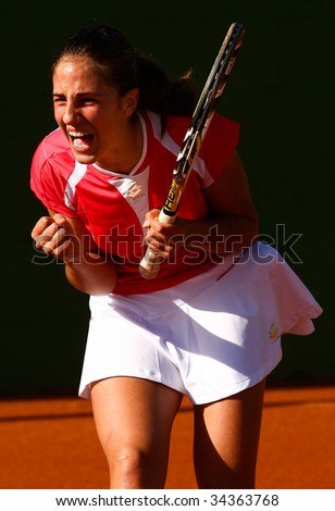 MALAGA, SPAIN – JANUARY 11 : Silvia Fuentes celebrates victory during the final match of the 1st round of the Nike Junior Tennis Tour tournament at Malaga Tennis Club January 11, 2009 in Malaga.