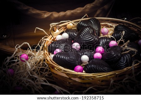 home made chocolates in metal basket with lady brown purse