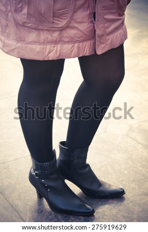 Slim model legs in stockings. winter fashion creation