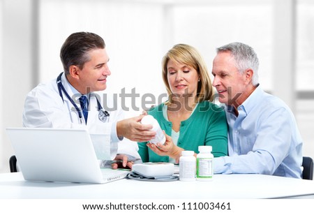 Smiling medical doctor and patient. Health care.