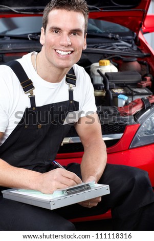 Auto mechanic with tablet. Car repair service.