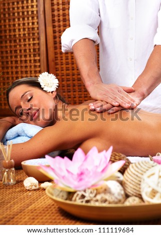 Young woman in Spa massage salon. Relax.