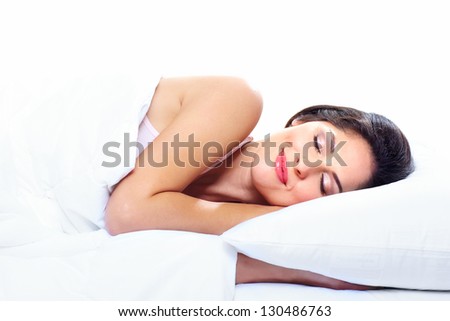 Beautiful sleeping woman in the bedroom. Relax.