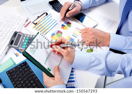Hand with calculator. Finance and accounting business.