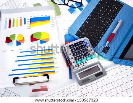 Calculator and computer in the office. Finance and accounting business.