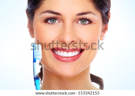 Beautiful woman with toothbrush. Dental care background.